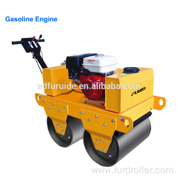 Compact design walk behind vibratory road roller